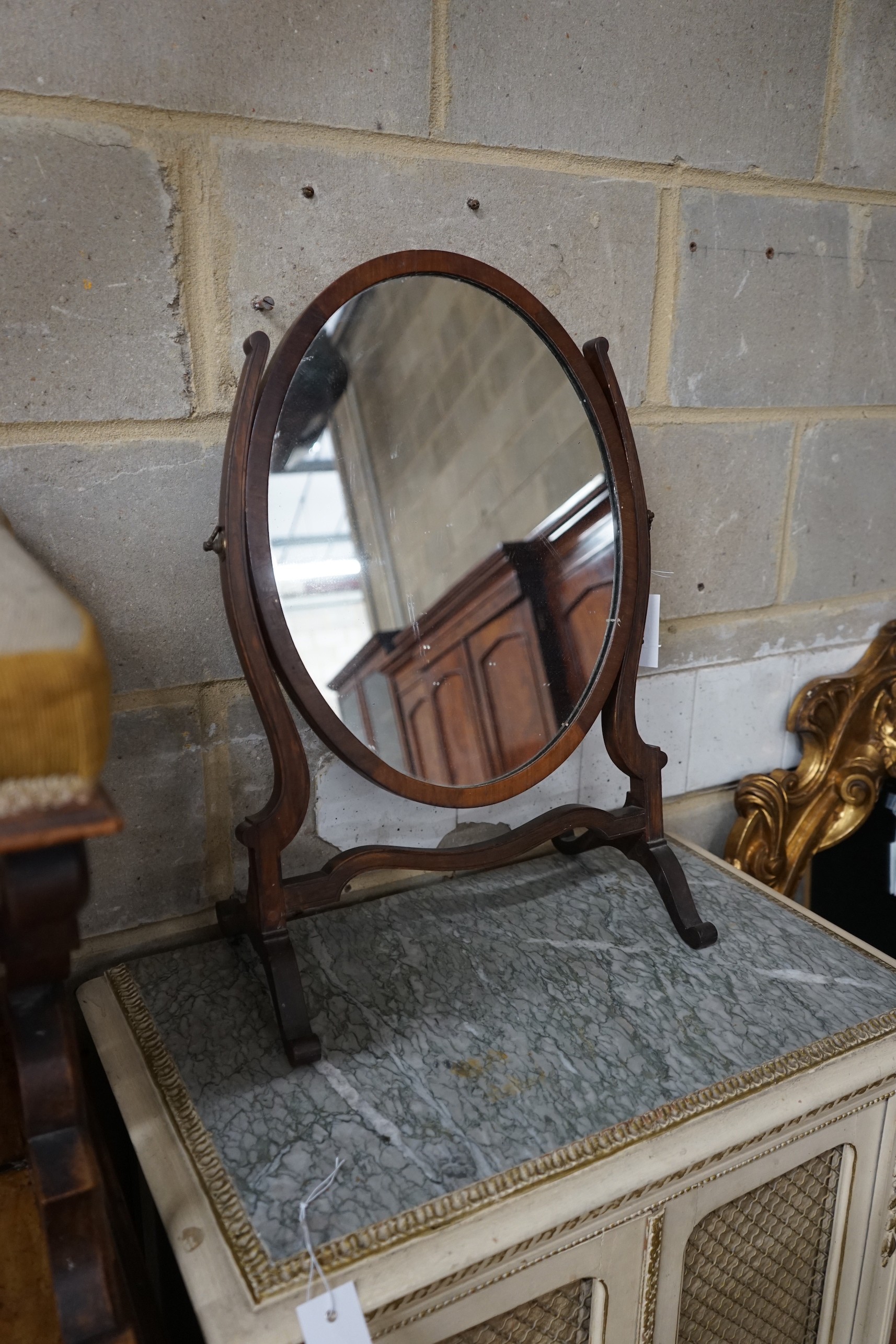 An 18th century walnut toilet mirror, height 56cm, a Victorian X frame stool and a skeleton framed toilet mirror